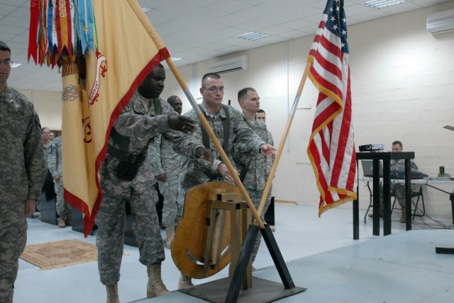 CAMP TAJI, Iraq - Lake Village, Ark. Native, Staff Sgt. DeForest Robinson (left), and Rushville, Ind. Native, Spc. Clint Hornaday (right), both assigned to 115th Brigade Support Battalion, 1st Brigade Combat Team, 1st Cavalry Division, place the batt...