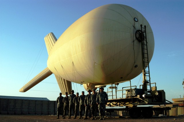 CONTINGENCY OPERATING LOCATION Q-WEST, Iraq - The crewmembers of Q-West's 17-meter Aerostat pose for a unit picture Nov. 7. The aerostat crewmembers - all from A Company, 2nd Battalion, 198th Combined Arms, out of Hernando, Miss., and attached to...