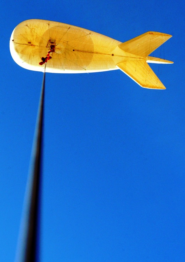 CONTINGENCY OPERATING LOCATION Q-WEST, Iraq - The 17-meter Aerostat of Contingency Operating Location Q-West flies at full tether against a clear, calm sky Oct. 19. The aerostat - maintained and operated by crewmembers from A Company, 2nd...