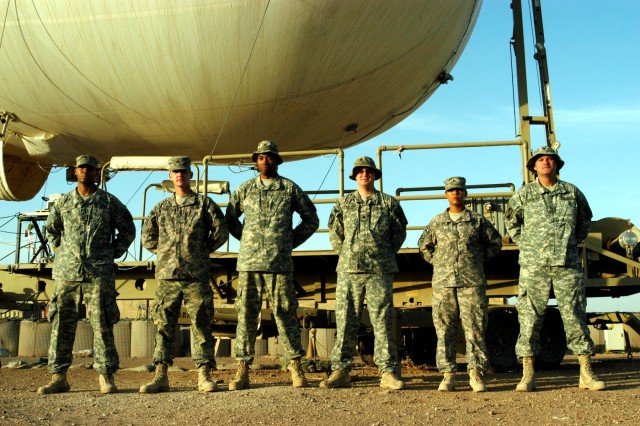 CONTINGENCY OPERATING LOCATION Q-WEST, Iraq - Alpha Team of Q-West's 17-meter Aerostat (from left) - crewmembers Pfc. Kedrian C. Hardy, from Hernando, Miss., Pfc. William C. Williamson, of Seattle, Wash., Pfc. Alex G. Anthony, of Memphis, Tenn.,...