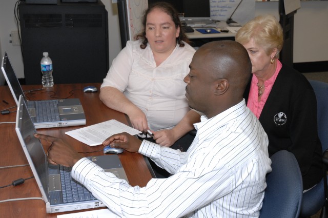 Civilian Education System students work as a team