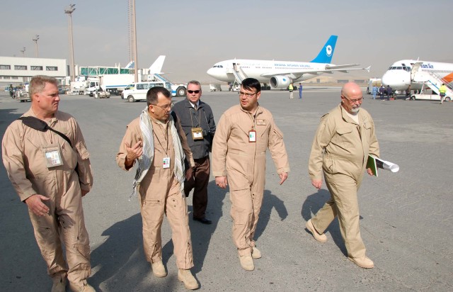 Project team on the tarmac at Kabul International Airport