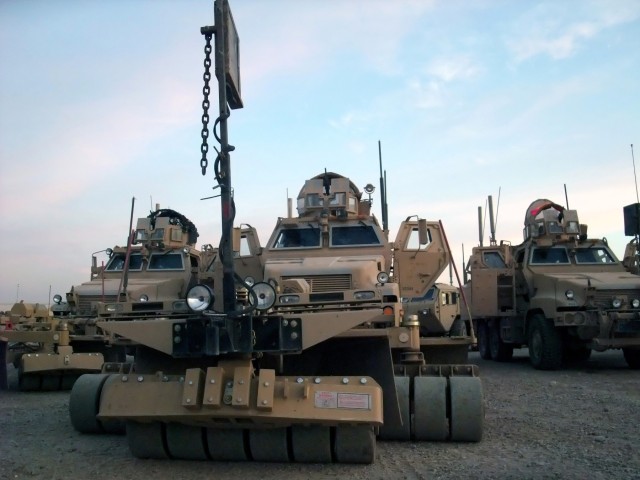 CONTINGENCY OPERATING LOCATION Q-WEST, Iraq - The gun trucks of 1st Platoon, B Company, 2nd Battalion, 198th Combined Arms out of Greenwood, Miss., assembled in the Convoy Readiness Center yard at Forward Operating Base Warrior Nov. 25.  Lt. Col....