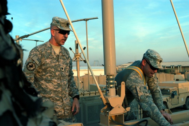 CONTINGENCY OPERATING LOCATION Q-WEST, Iraq - Lt. Col. Kerry Goodman (left), a Meridian, Miss., native and commander of 2nd Battalion, 198th Combined Arms, out of Senatobia, Miss., and Staff Sgt. Jonathan A. Parks, a native of Grenada, Miss., and...