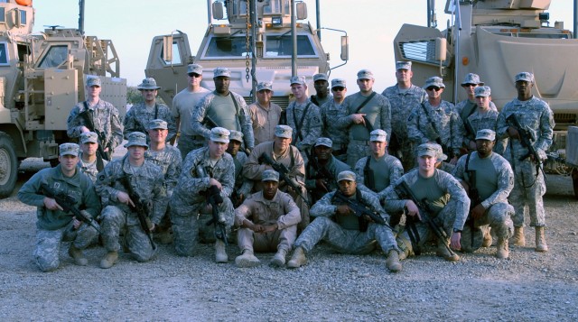 CONTINGENCY OPERATING LOCATION Q-WEST, Iraq - Members of B Company, 2nd Battalion, 198th Combined Arms out of Greenwood, Miss., pose with Lt. Col. Kerry Goodman, a Meridian native and commander of 2nd Battalion, 198th Combined Arms headquartered...