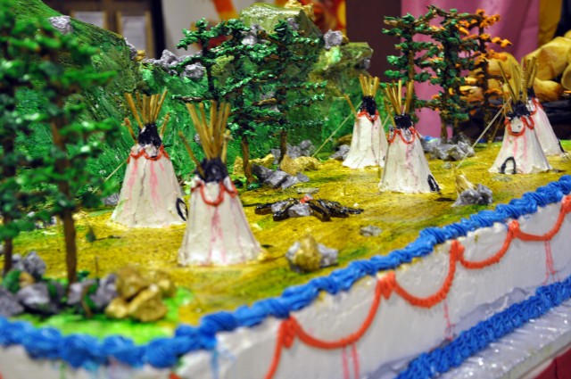 A 3-D cake made by Sixto Jimenez, a San Jose Del Monte, Philippines, native and head baker for the dining facility here, sits on display at Thanksgiving dinner next to a dining facility entrance here, Nov. 26. (U.S. Army photo by Sgt. Matthew C....
