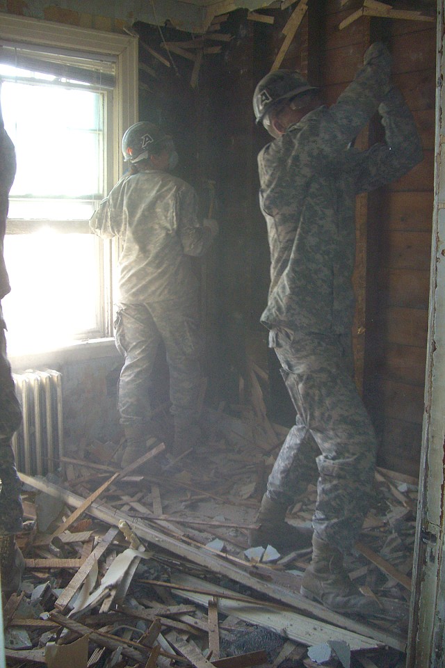 Cadets help with demo of Habitat house