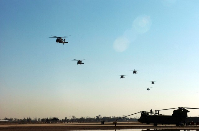 CAMP TAJI, Iraq-Six UH-60 Black Hawk helicopters from 3rd Battalion, 227th Aviation Regiment, 1st Air Cavalry Brigade, 1st Cavalry Division, depart the flightline, here, Dec. 3, on their way to al-Asad, where 3-227th will  become a detachment...
