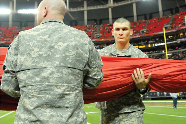 Soldiers pull duty on Falcons Fitness Flag Crew
