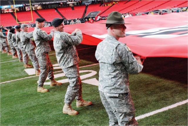 Soldiers pull duty on Falcons Fitness Flag Crew