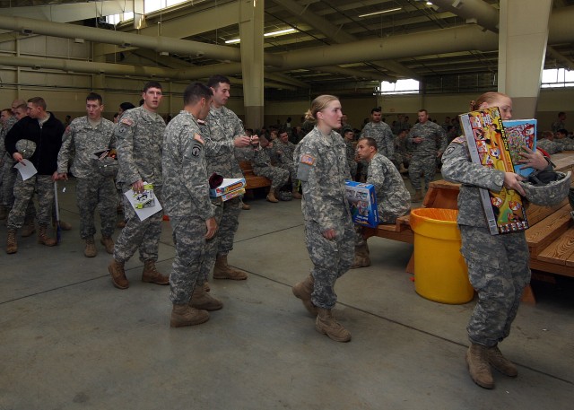 Jump for toys - Fort Bragg paratroopers earn wings, help community during Operation Toy Drop