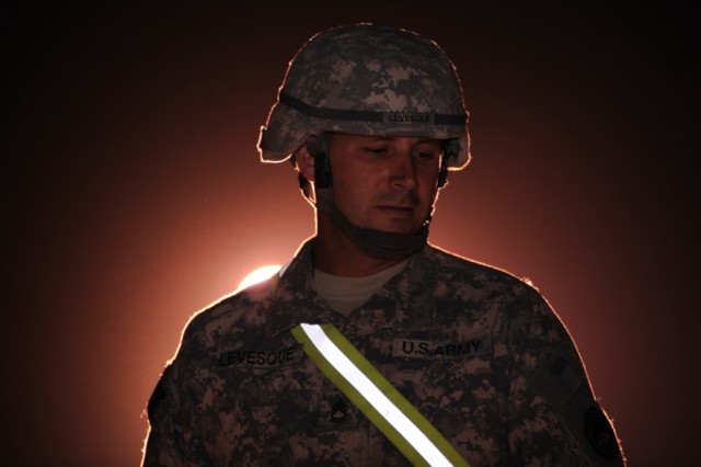 Sgt. 1st Class Joseph Levesque, a platoon sergeant with the 1083d Transportation Company, from Bossier City, La., oversees progress in the loading of tanks during a recent op move. (U.S. Army photo by Sgt. 1st Class Thomas Benoit, 1083rd Transportati...