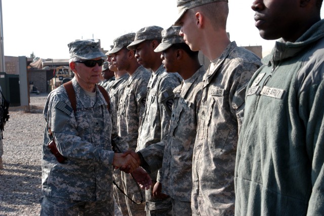 CONTINGENCY OPERATING LOCATION Q-WEST, Iraq - Brig. Gen. William L. Freeman, Jr., the adjutant general of the Mississippi National Guard, greets Soldiers of G Company, 106th Brigade Support Battalion, headquartered in Louisville, Miss, and attached t...