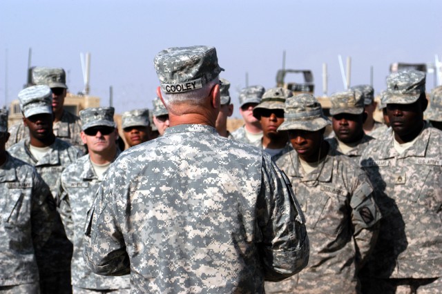 CONTINGENCY OPERATING LOCATION Q-WEST, Iraq - Command Sgt. Maj. Donald L. Cooley, the senior noncommissioned officer of the Mississippi National Guard, speaks with Soldiers of G Company, 106th Brigade Support Battalion, headquartered in Louisville, M...
