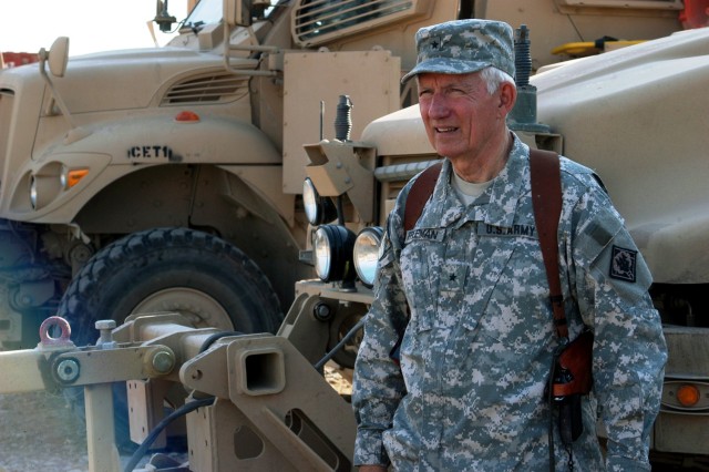 CONTINGENCY OPERATING LOCATION Q-WEST, Iraq - Brig. Gen. William L. Freeman, Jr., the adjutant general of the Mississippi National Guard, stands before a Mine-Resistant, Ambush-Protected gun truck during a Nov. 26 visit with the Soldiers of 2nd Batta...