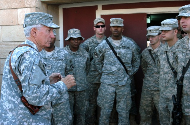 CONTINGENCY OPERATING LOCATION Q-WEST, Iraq - Brig. Gen. William L. Freeman, Jr. (left), the adjutant general of the Mississippi National Guard, speaks with Soldiers of A Company, 2nd Battalion, 198th Combined Arms, out of Hernando, Miss., during a N...