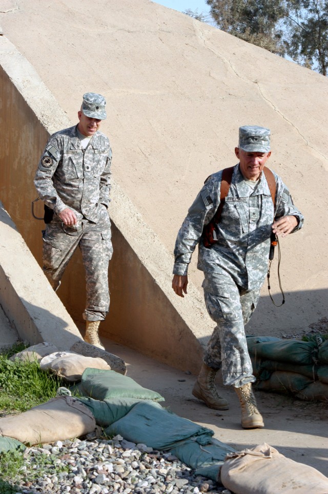 CONTINGENCY OPERATING LOCATION Q-WEST, Iraq - Lt. Col. Kerry Goodman (left), commander of 2nd Battalion, 198th Combined Arms, out of Senatobia, Miss., and Brig. Gen. William L. Freeman, Jr., the adjutant general of the Mississippi National Guard, fin...