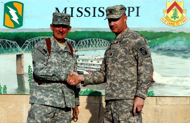CONTINGENCY OPERATING LOCATION Q-WEST, Iraq - Brig. Gen. William L. Freeman, Jr., the adjutant general of the Mississippi National Guard, poses with Lt. Col. William B. Smith, Jr., a Hattiesburg, Miss., native and mayor of Q-West in front of the base...