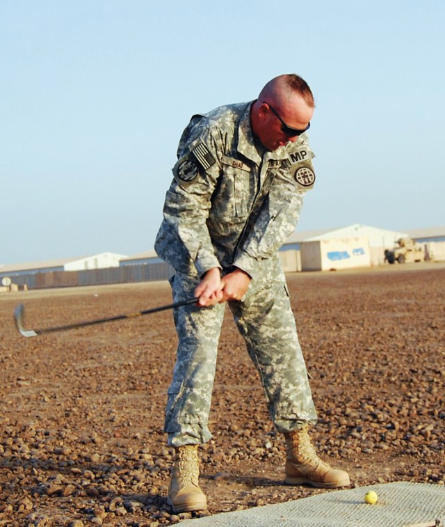 Deployed 705th MPAca,!E+Soldiers get gift of golf