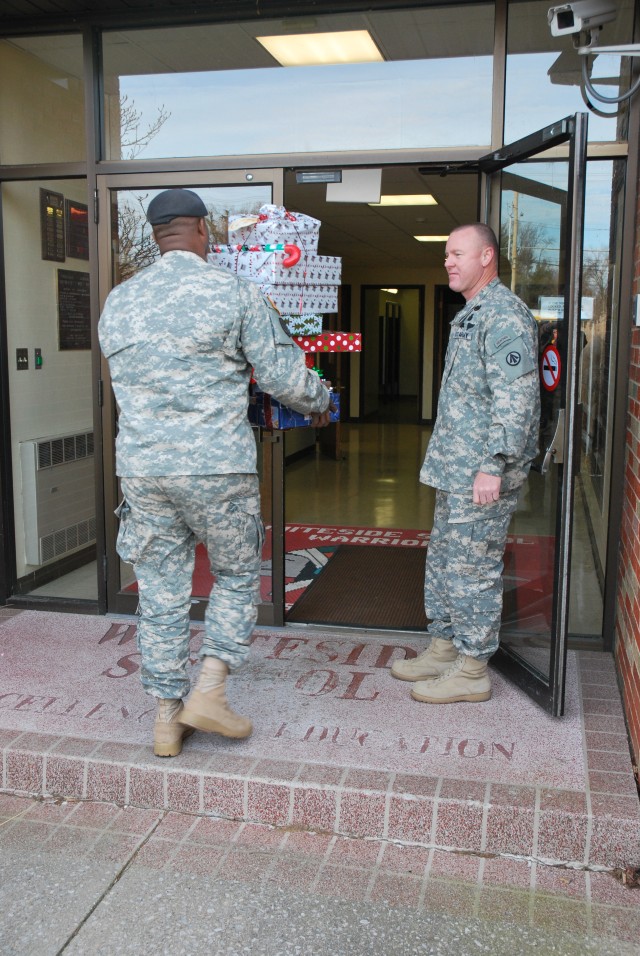 SDDC Soldiers deliver Angel Tree gifts to local schools