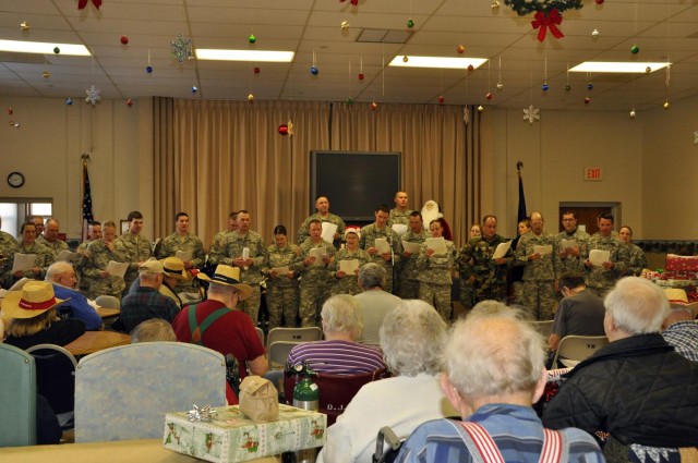 Guard troops sing to veterans