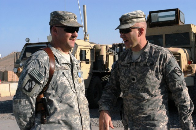 CONTINGENCY OPERATING LOCATION Q-WEST, Iraq - Staff Sgt. Donavan Smith (left) - a Taylorsville, Miss., native and non-commissioned officer in charge of maintenance with A Company, 106th Brigade Support Battalion, headquartered in Magee, Miss., and...