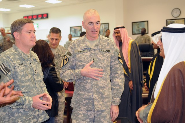BAGHDAD-Maj. Gen. Terry Wolff (left), commander of the 1st Armored Division and Maj. Gen. Daniel Bolger (center), commander of United States Division-Center and the 1st Cavalry Div., meet with prominent tribal sheikhs from the Baghdad area, Jan. 5. T...