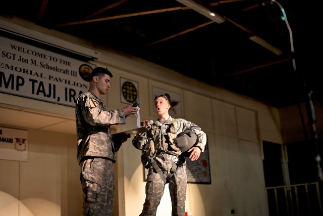 CAMP TAJI, Iraq - Spc. Ryan Durmisevich (right), from Redlands, Calif., and Spc. Jason Honore, from Vancouver, Wash., both with 1st Air Cavalry Brigade, 1st Cavalry Division, performed a comedy skit during a New Year's Eve talent show, here, Dec....