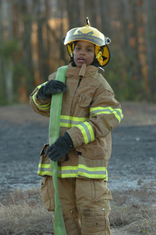 Youngsters learn basics of firefighting from the pros