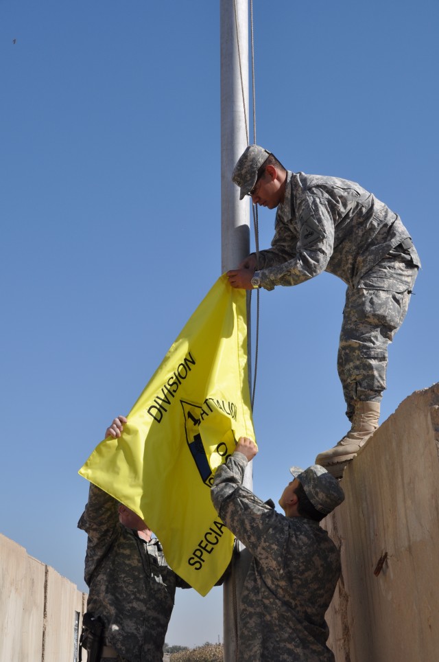 Raising the 1st Armored Division Special Troops Battalion flag