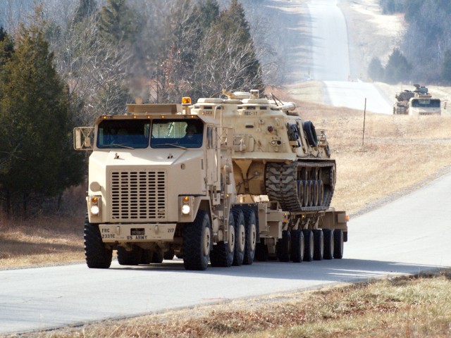 233rd Trans. Co. transports vehicles to improve ranges, gain experience