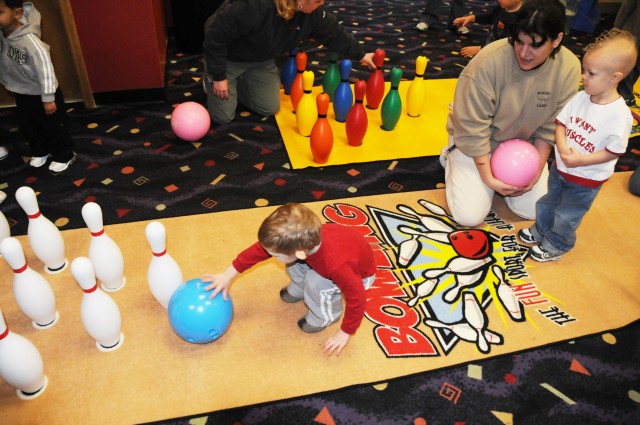 Fort Rucker toddlers tackle 10-pin sport, develop motor skills