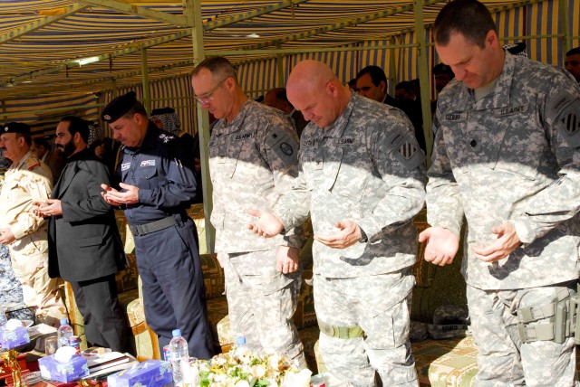 guests stand for prayer