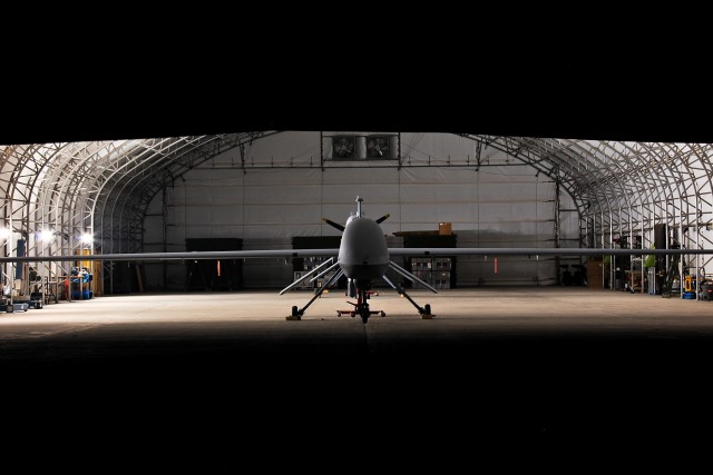 CAMP TAJI, Iraq - An MQ-1C Sky Warrior unmanned aircraft system from Quick Reaction Capability 1, attached to 1st Air Cavalry Brigade, 1st Cavalry Division, U.S. Division - Center, sits dormant in a hanger. The Sky Warrior aircraft has the ability to...