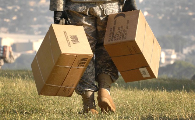 U.S. troops deliver food to quake victims