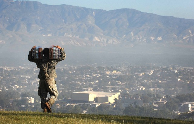 U.S. troops deliver food to quake victims