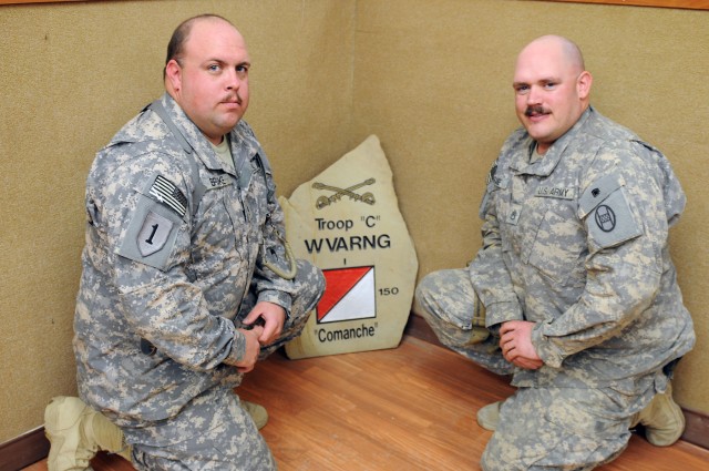 Brothers serving together