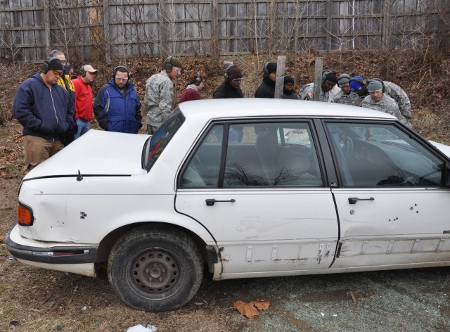 Team inspects bullet-filled vehicle