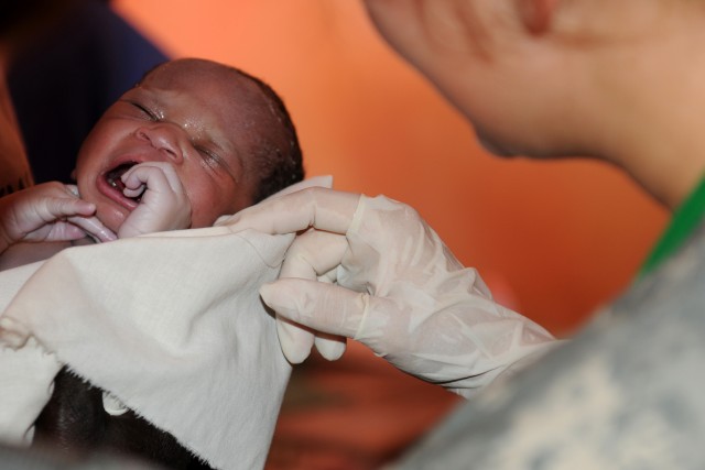 Army Reserve nurse delivers baby in rural Uganda