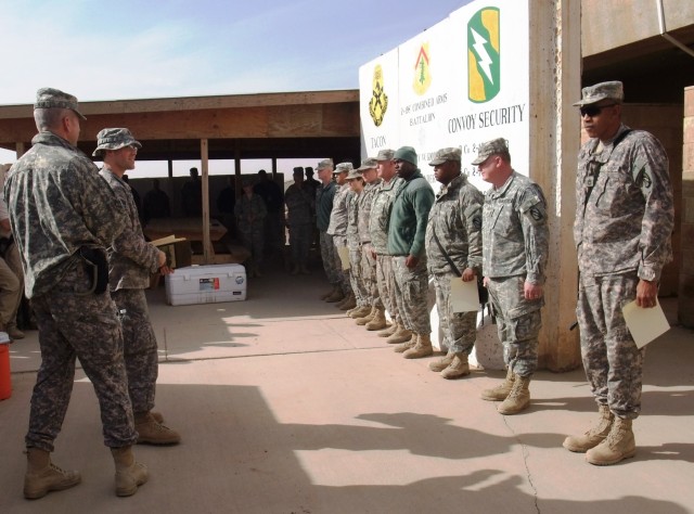 CONTINGENCY OPERATING LOCATION Q-WEST, Iraq - Lt. Col. Kerry Goodman (foreground), a Meridian, Miss., resident and commander of 2nd Battalion, 198th Combined Arms, out of Senatobia, Miss., and Capt. Robert P. Sayle, battalion safety officer and...