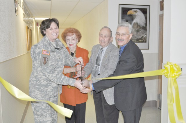 From left, Maj. Gen. Susan Lawrence, commanding general, Network Enterprise Technology Command/9th Signal Command (Army), Betty Olson,  Jerry King, and Daniel Bradford, civilian deputy commander and senior technical director for NETCOM/9th SC (A),...