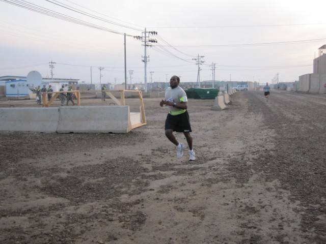 Cpl. Terrance Clausell, a 498th Transportation Company, 541st Combat Sustainment Support Battalion, 15th Sustainment Brigade, 13th Sustainment Command (Expeditionary), heavy equipment operator and Mobile, Ala., native, completes the five-kilometer...