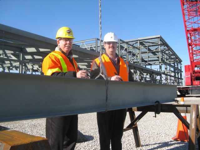 Project Managers Signing Beam