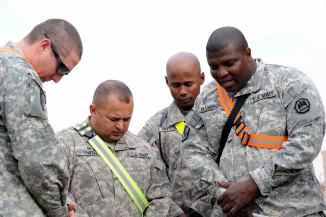 Spc. Shanesel Dawson, a Shreveport, La., native, and the Nuclear Biological and Chemical noncommissioned officer in charge for 1083rd Transportation Company, 264th Combat Support Supply Battalion, 15th Sustainment Brigade, 13th Sustainment Command...
