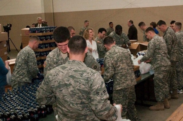 Fort Bragg volunteers pack Super Bowl care packages for Soldiers