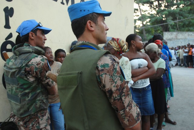 Jordanians secure World Food Program distribution point