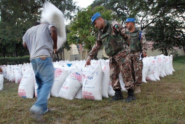 Jordanians secure World Food Program distribution point