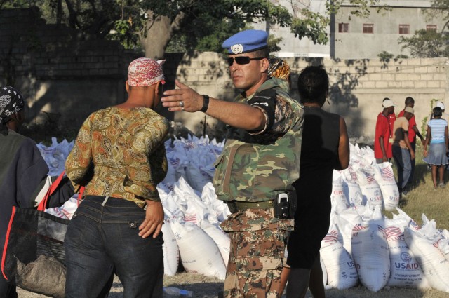 Jordanians secure World Food Program distribution site