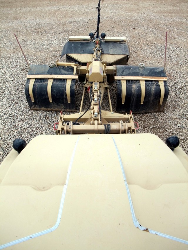 CONTINGENCY OPERATING LOCATION Q-WEST, Iraq - Seen from the gunner's turret is the Self-Protection Adaptive Roller Kit of a scout truck in 1st Platoon, B Company, 2nd Battalion, 198th Combined Arms, 155th Brigade Combat Team, out of Greenwood, Miss. ...