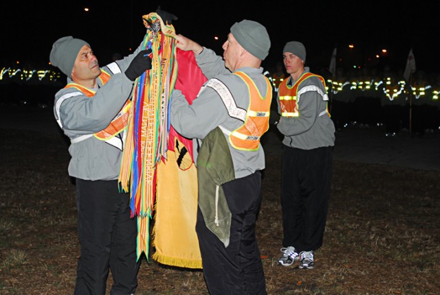 Col. Ryan Gonsalves (left), the commander of 2nd Brigade Combat Team, 1st Cavalry Division, and Command Sgt. Maj. Jeffery Hof, the brigade senior enlisted leader, uncase the brigade's colors at Fort Hood, Feb. 2. The brigade returned from Iraq in lat...